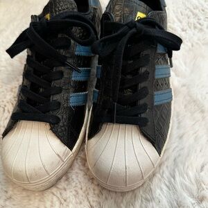 Adidas Black and Gold Sneakers